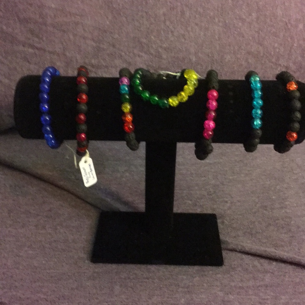 Handmade lava bead and glass bead bracelets.